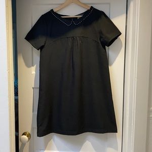 Black mini dress with beaded collar